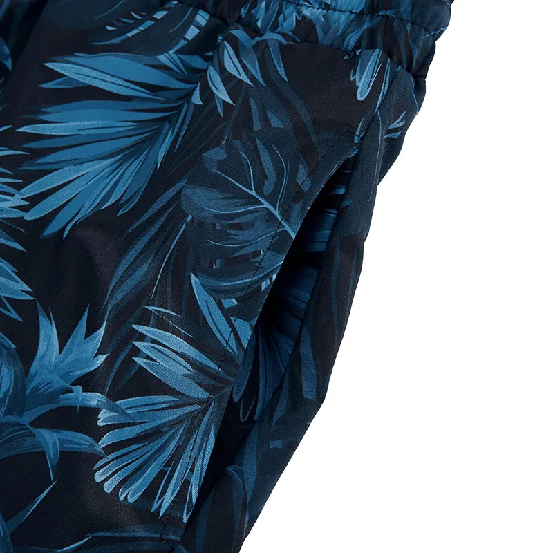 TROPICAL PRINTED SWIM TRUNKS