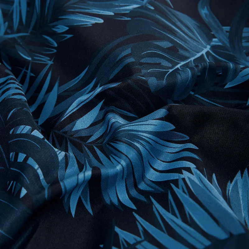 TROPICAL PRINTED SWIM TRUNKS